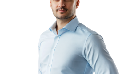 Confident young man in a light blue shirt poses with a relaxed expression. Ideal for business concepts, professional growth, or lifestyle imagery.