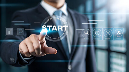 entrepreneurship tips business execution A businessman activating a digital interface labeled "START" in a modern office setting.
