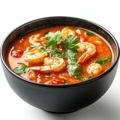 A steaming bowl of shrimp soup garnished with fresh herbs, featuring vibrant colors and a rich, flavorful broth.