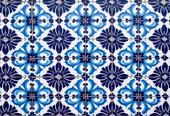 Intricate Moroccan Tile Patterns: Close-Up of Blue and White Geometric and Floral Designs, Perfect for Interior Design, Architecture, and Cultural Backgrounds.

