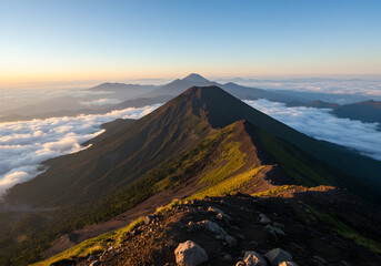 Majestic Mountain Ridge Above the Clouds at Sunrise