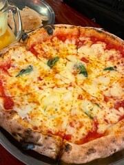 A delicious pizza with a golden crust, melted cheese, and savory toppings. Perfect for food-related designs, menus, or Italian-themed projects, capturing the essence of a classic comfort dish.
