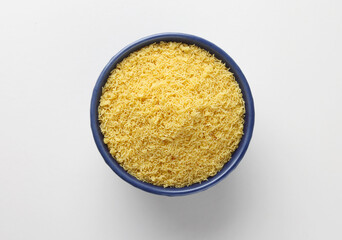 Indian food snacks called barik shev serve in bowl isolated on white background 