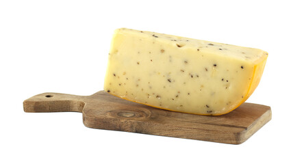 Piece of cheese with herbs resting on wooden cutting board