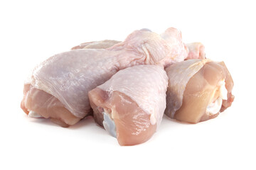 Fresh raw chicken drumsticks isolated on white background