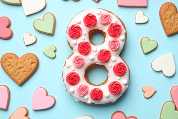 Light blue background donut number 8 shape roses heart cookies (1)