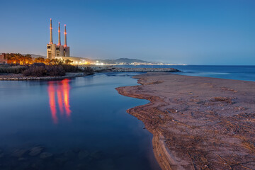 The shutdown thermal power station and the mouth of the Besos river at Sant Adria near Barcelona...