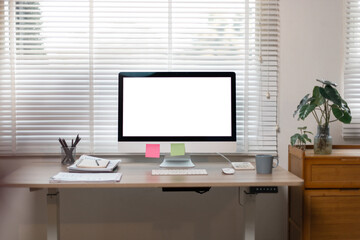  Desktop computer Blank screen PC in minimal workplace office room with decorations and copy space modern 
