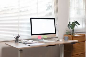  Desktop computer Blank screen PC in minimal workplace office room with decorations and copy space modern 
