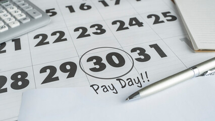 Reminder on the 30th of the calendar written payday. Day 30 marked with a circle