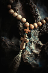 Rosary with rhe cross and beads. Symbol of prayer and religion, christianity