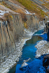 The basalt columns at Studlagil Canyon, at the east region of Iceland, winter time.