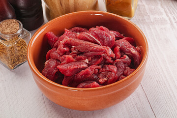 Raw beef meat - sliced strips