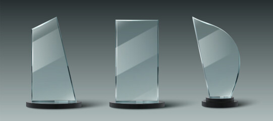 Glass trophy collection with transparent awards, black base stands, minimalist geometric shapes. Realistic 3d crystal acrylic prizes for corporate achievements, competitions, ceremonies designs.