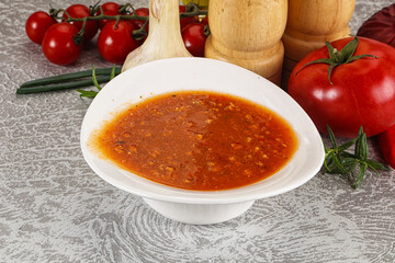 Hot tomato soup with diced chicken