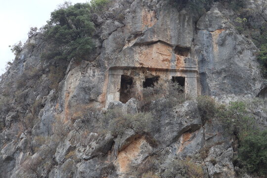 View of the Tomb of Amyntas in Fethiye, Mugla, Turkey. The Lycian Rock Tombs at ancient Telmessos currently in Fethiye is a popular tourist attraction in Turkey.