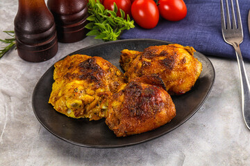 Roasted chicken thighs  with spices