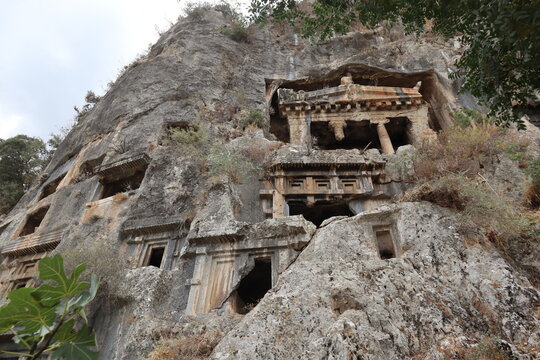 View of the Tomb of Amyntas in Fethiye, Mugla, Turkey. The Lycian Rock Tombs at ancient Telmessos currently in Fethiye is a popular tourist attraction in Turkey.