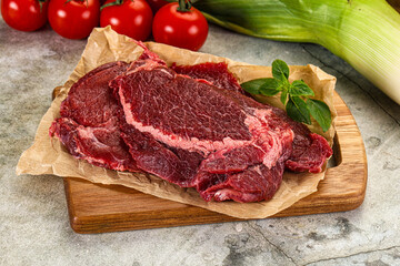 Raw beef cheeks cut for cooking