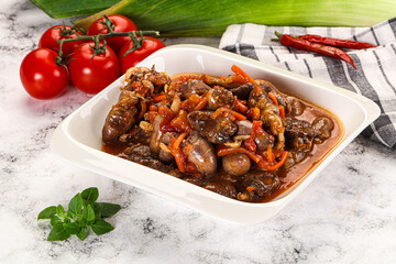Baked chicken hearts with vegetables