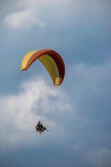 Paragliding over the clouds sunset view at Bir Billing Himachal Pradesh India. Clouds in the sky