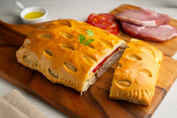 Spanish Hornazo. Traditional Spanish pie filled with Iberian pork loin and other ingredients such as sausages or vegetables.