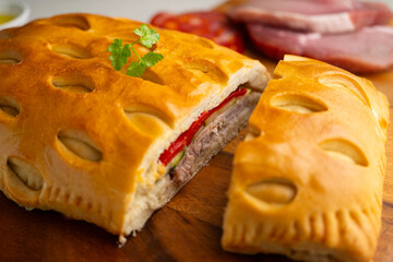 Spanish Hornazo. Traditional Spanish pie filled with Iberian pork loin and other ingredients such as sausages or vegetables.