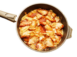 Frying pan with meat and onions isolated on white background