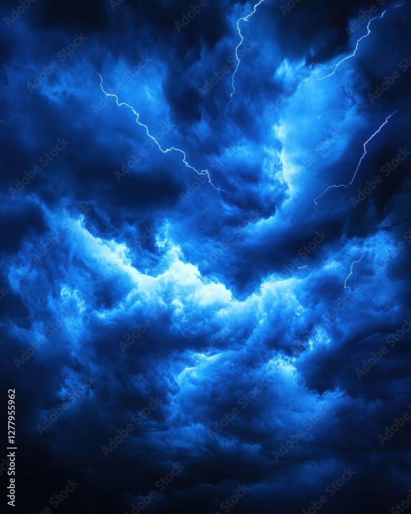 Wall mural dramatic blue storm clouds illuminated by lightning strikes creating a powerful and atmospheric scen