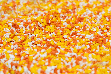 Close-up microplastics in container from plastic waste on human hand. Plastic scraps from waste materials are harmful to the environment and human life.