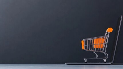 Online Shopping Concept with Shopping Cart on Laptop Display