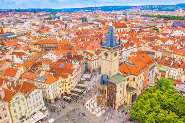 A breathtaking aerial view of Old Town Square in Prague, showcasing its historic landmarks, vibrant atmosphere, and iconic Astronomical Clock, capturing the charm of this famous European destination