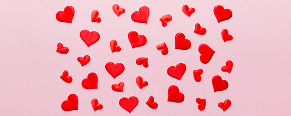 Valentine day background with red hearts, top view with copy space