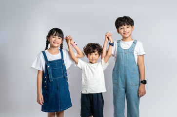 Obraz premium group image of cute asian kids posing on white background