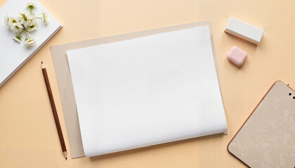 A folded paper mockup surrounded by elegant accessories like flowers and pencils. The soft color palette creates a luxurious and sophisticated atmosphere, perfect for stationery or branding designs.