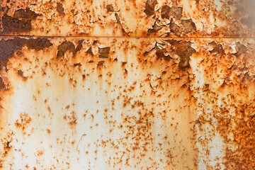 White metal surface with bright smudges of rust background