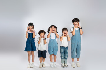 Obraz premium group image of cute asian kids posing on white background