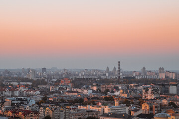 Kyiv cityscape at twilight with Belt of Venus in the sky