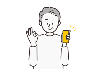 スマホを片手に持ってOKのポーズをしている男性_シニア