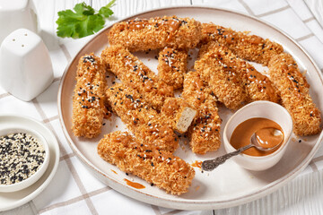 panko breaded tofu sticks with peanut butter sauce