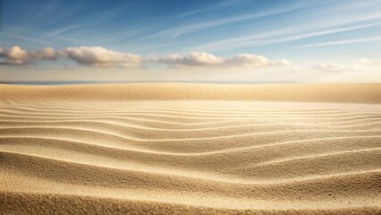 Naklejka premium Serene Coastal Dunescape A Sunlit Panorama of Undulating Sand and a Vast, Clear Sky