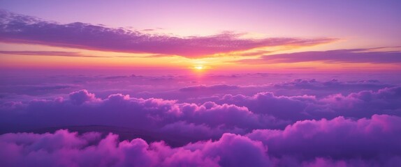 Obraz premium Colorful sunset over clouds with shades of purple and orange in a serene sky landscape.