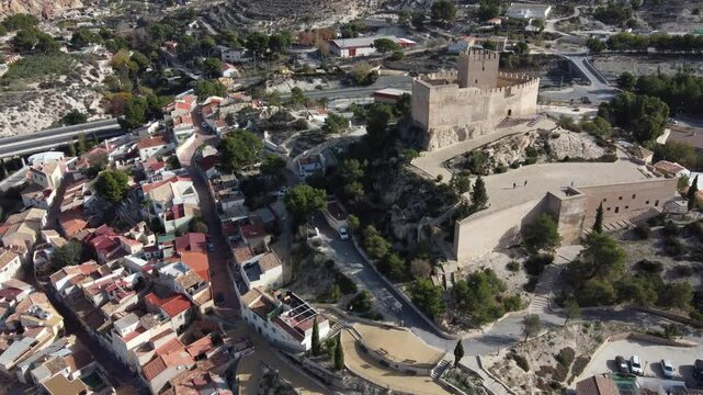 Aerial static view of the arab castle and oldest neighborhood of Petrer, Spain