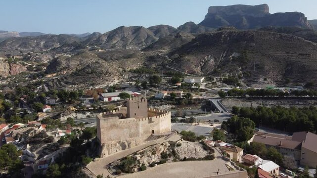 Aerial view of the Petrer arab castle, Spain, with the Maigmo mountains range in the background