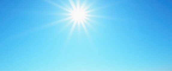 Obraz premium Bright sun shining against a clear blue sky with subtle light rays emanating outward creating a vibrant daytime atmosphere