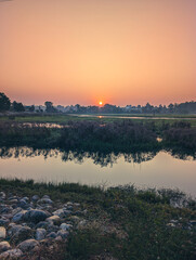 Naklejka premium Serene Sunrise at Asan Barrage, Dehradun