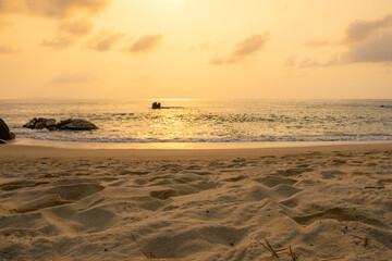 Nature sunset sky, the sun rises on the horizon, colorful sky at sea , nature concept background.	