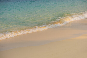 nature of the beach and sea Summer with sunshine, sandy beaches, clear blue waters sparkling against the blue sky. On an island with good ecology and environment Background for summer vacation
