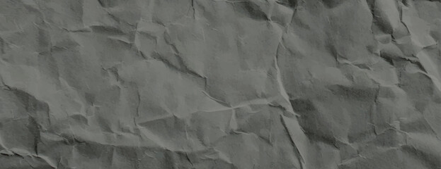 Gray crumpled paper background, textured and wrinkled. The background is gray, creating a rustic and artistic style. Paper texture background vector. Gray background.