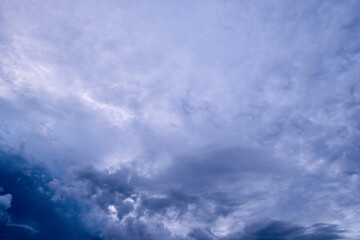 Obraz premium Dark sky with stormy clouds. Dramatic sky rain,Dark clouds before a thunder-storm.